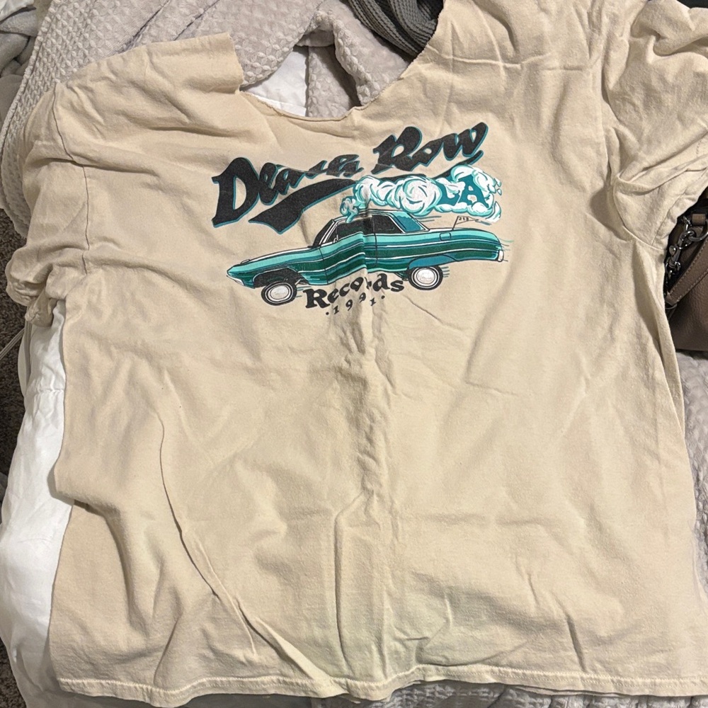 Spencer's Cream Graphic Tee with Blue Design
